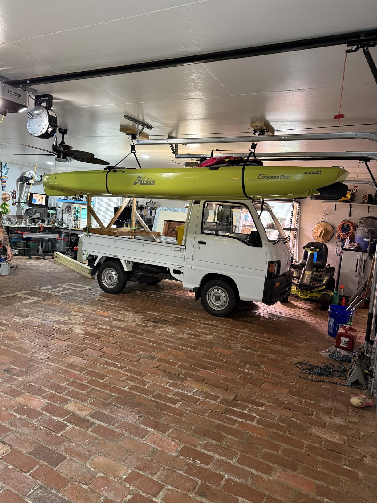Teal Triangle Heavy Duty Elite Kayak Hoist, Easy-Lift Garage Pulley System, Holds 150 lbs, Fits 12-Foot+ Ceilings, Patented No-Slip Strap, No Setup Required Customer Review Teal Triangle Heavy Duty Elite Kayak Hoist, Easy-Lift Garage Pulley System, Holds 150 lbs, Fits 12-Foot+ Ceilings, Patented No-Slip Strap, No Setup Required - Customer Photo 1